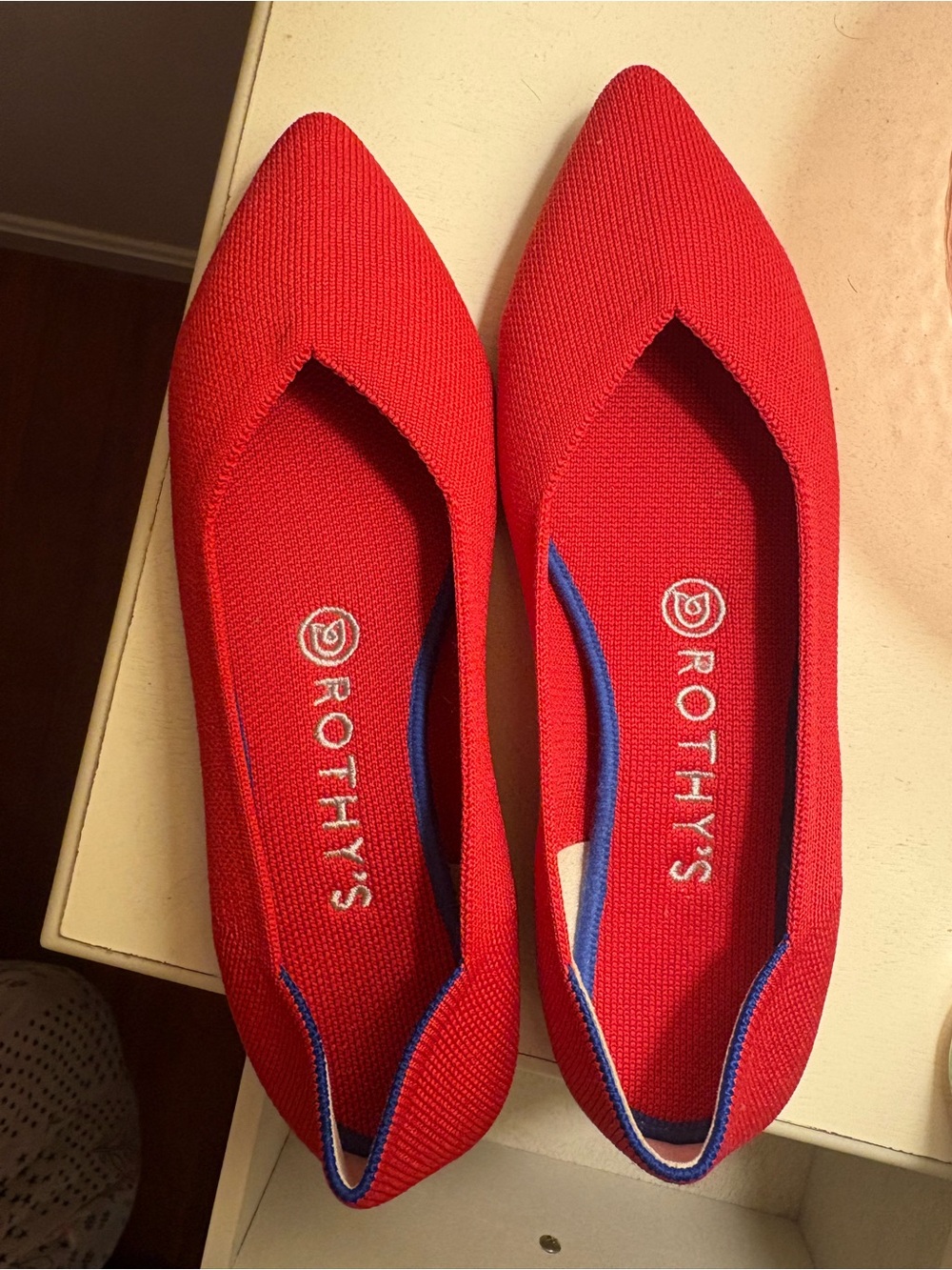 Rothy's Red Pointed Knit Flats with Blue Trim